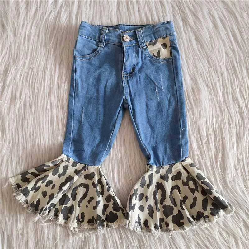 girl stitching design jeans with leopard print